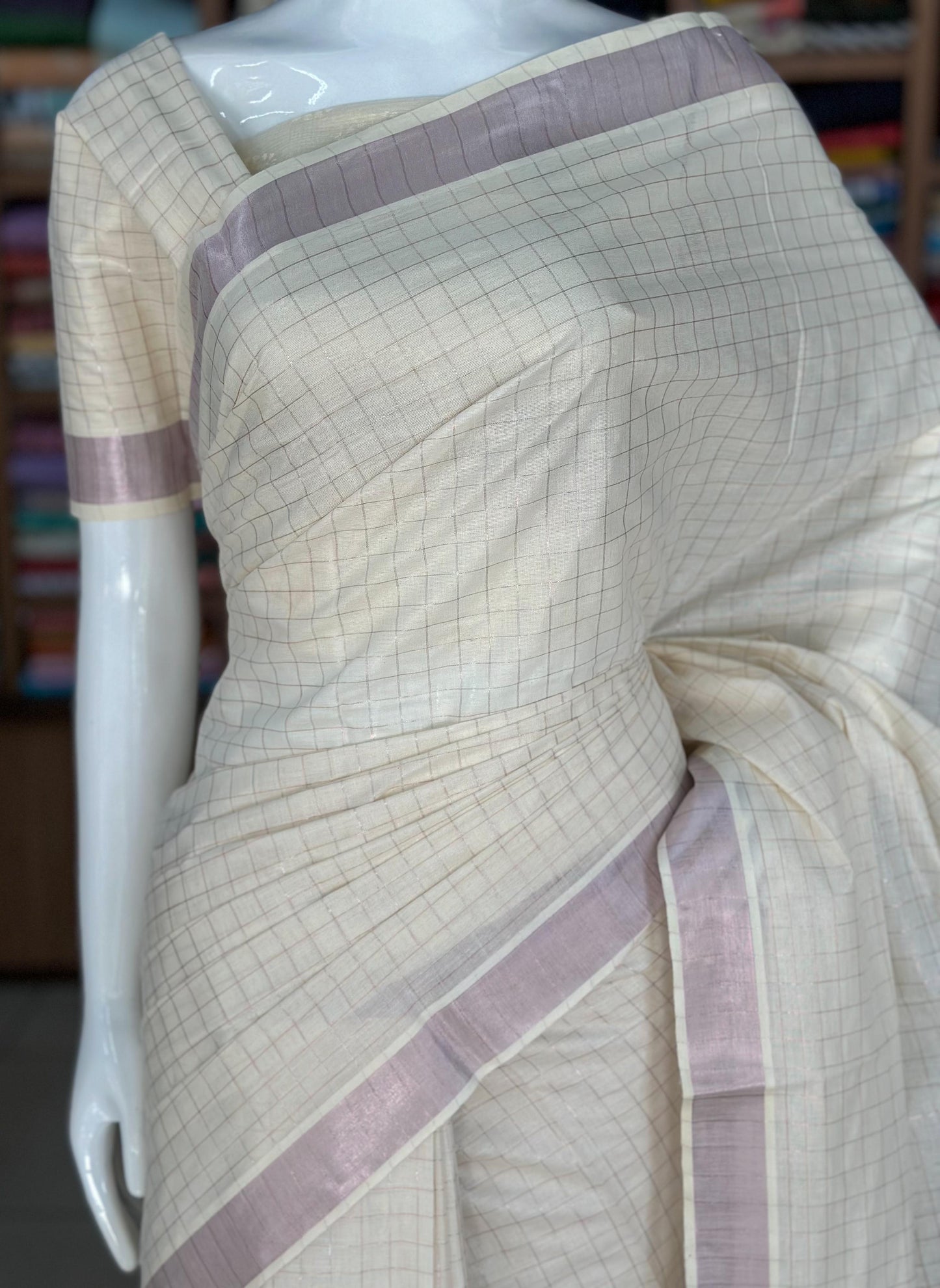 pink tissue kerala saree with checked pattern