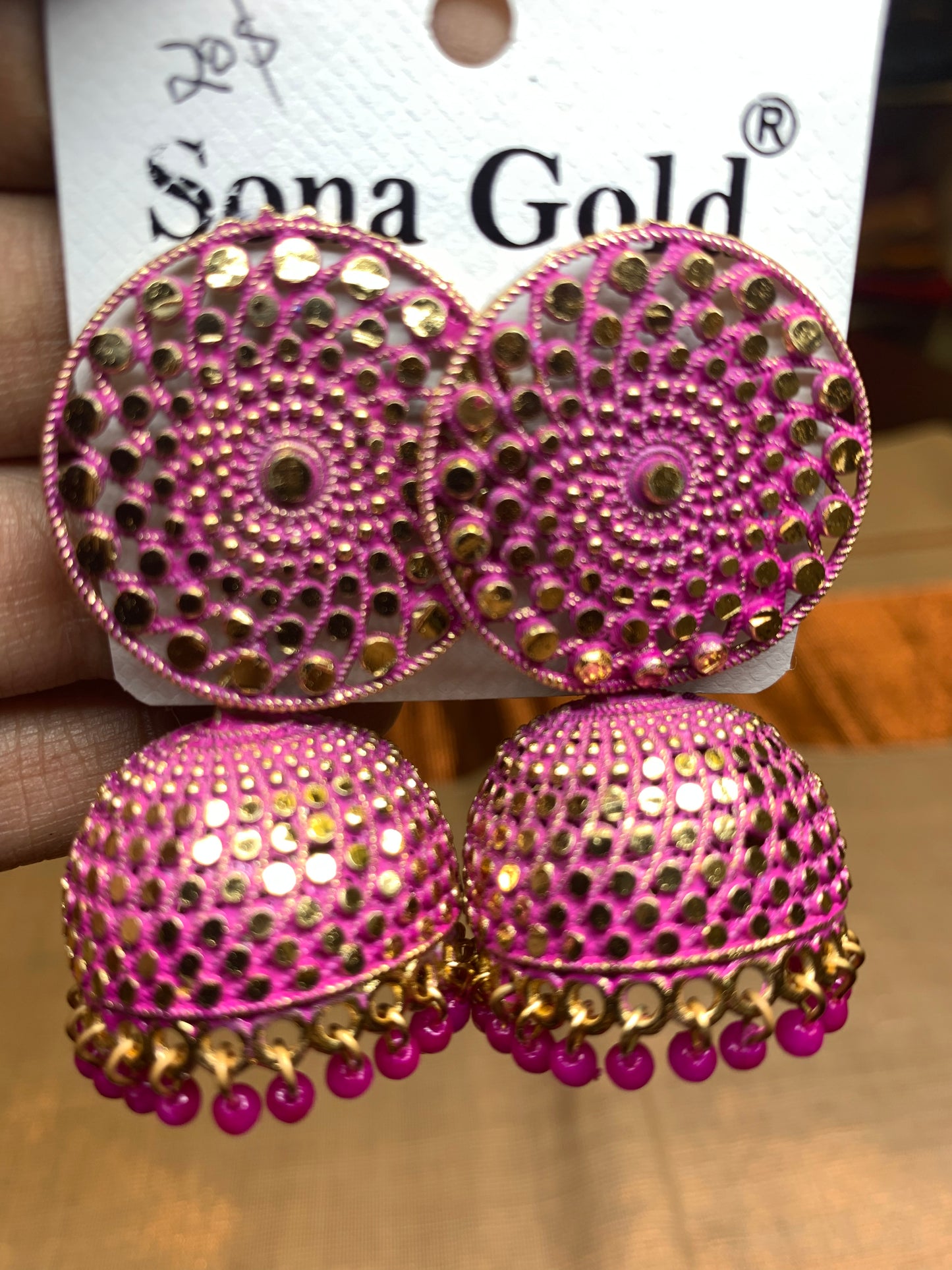 Pink round jhumka earring