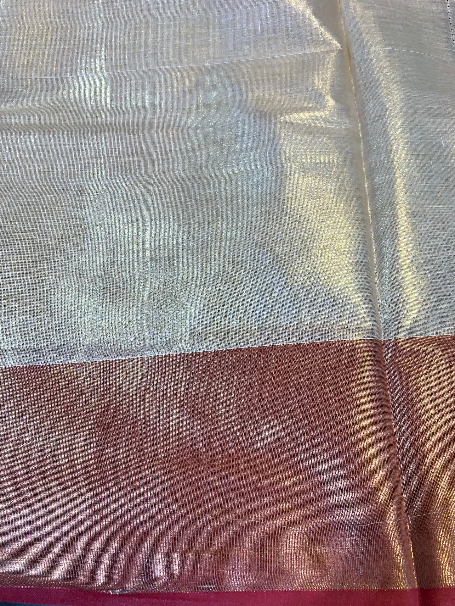 Golden tissue saree with light red  border