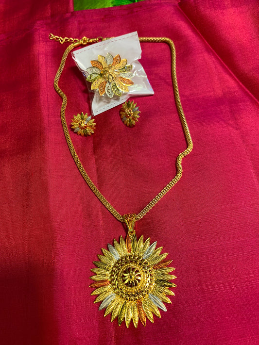 Golden chain with floral pendant