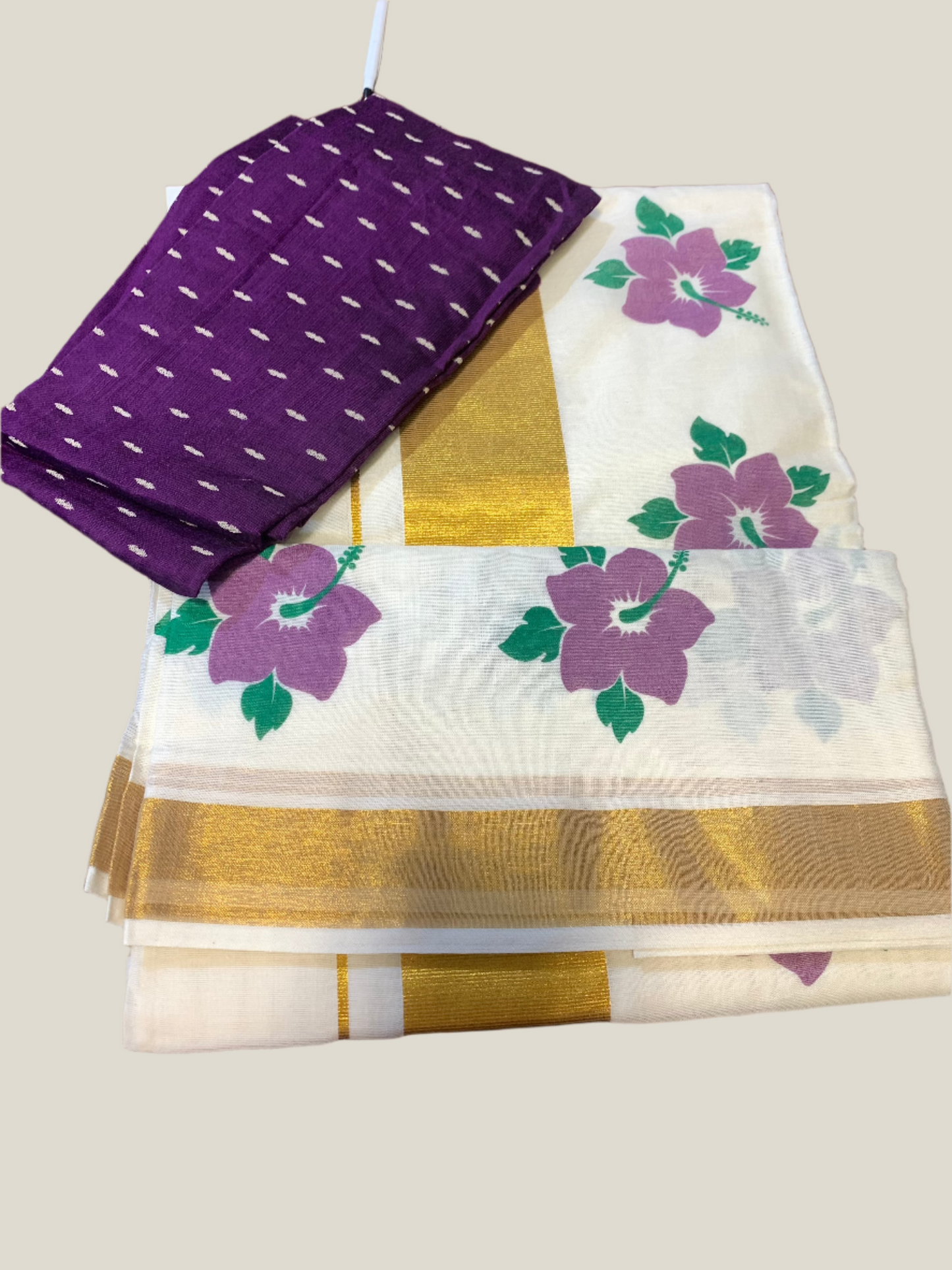 Kerala settu saree with purple floral printing with purple silk blouse material