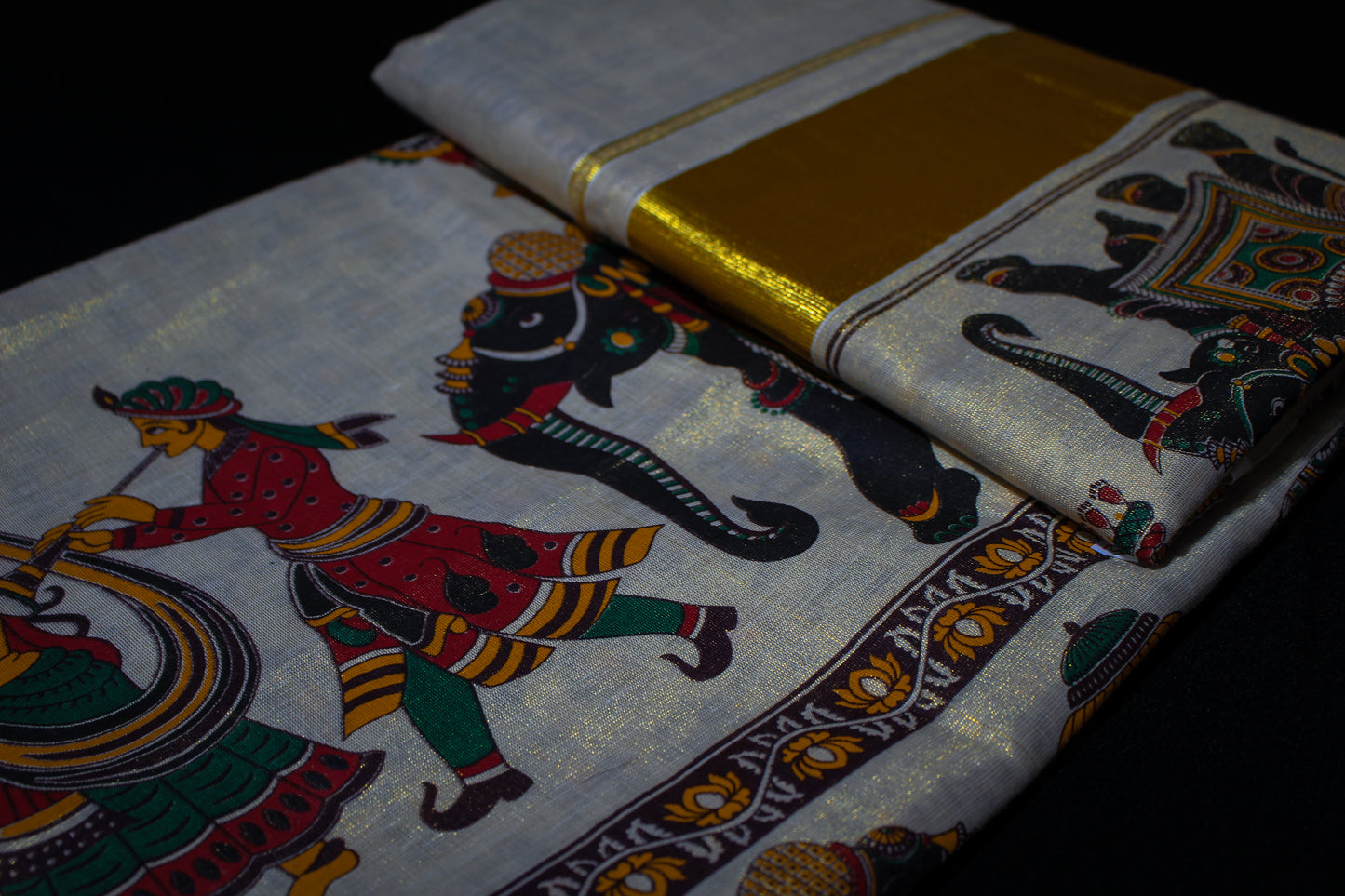 Tribal Printed Gold Tissue Kerala Saree
