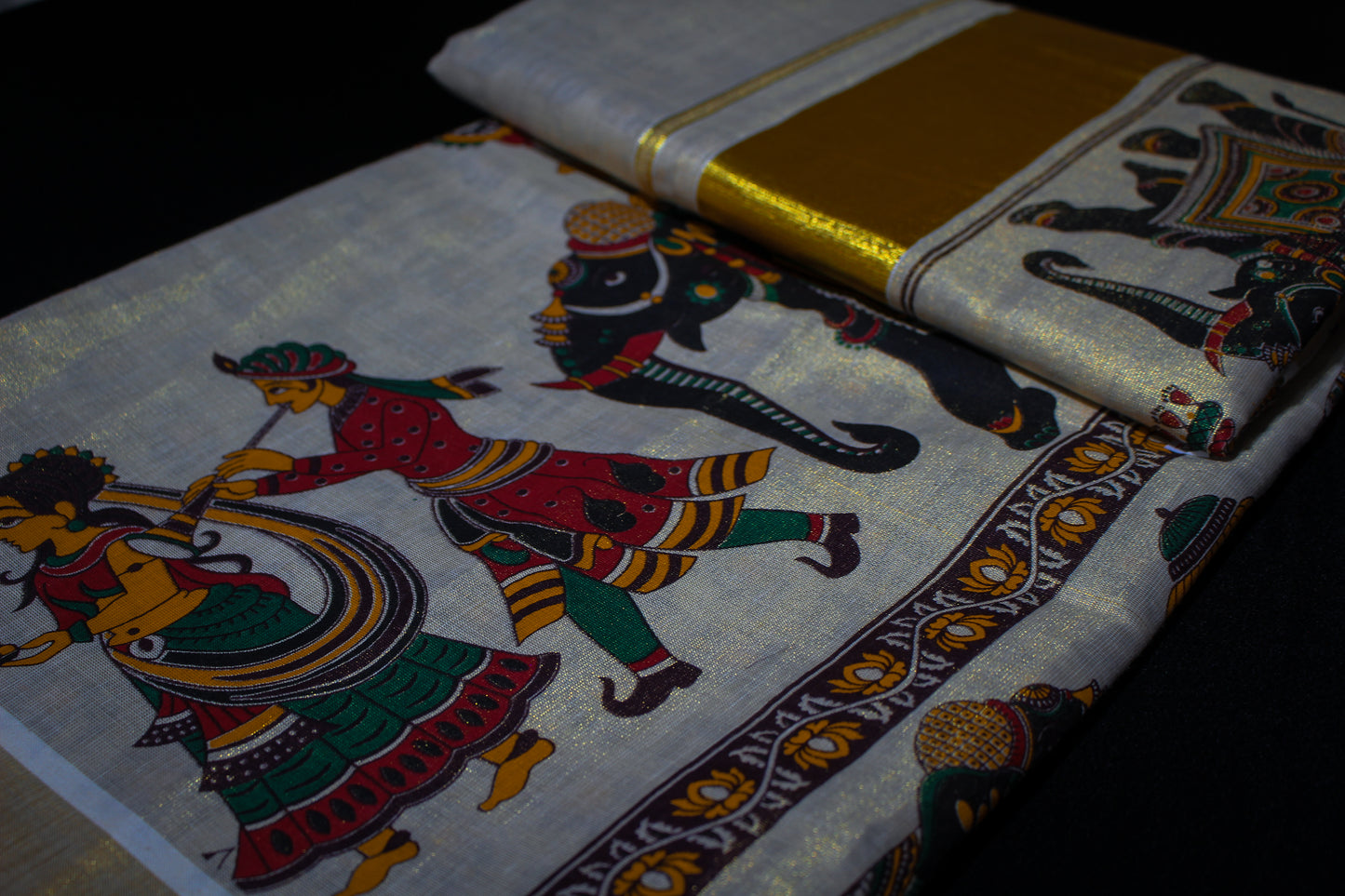 Tribal Printed Gold Tissue Kerala Saree