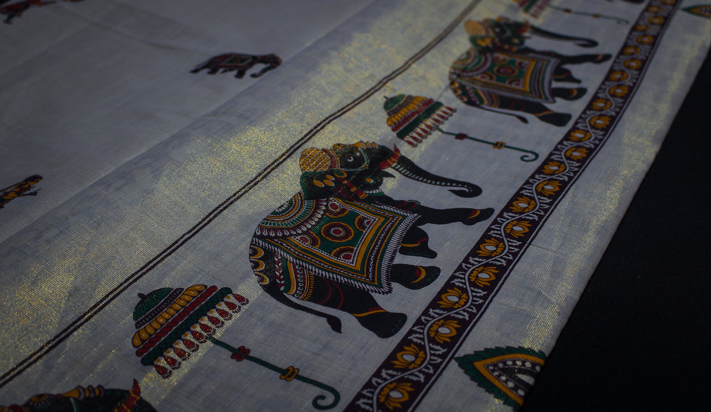 Tribal Printed Gold Tissue Kerala Saree
