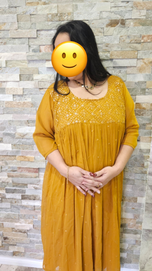 Front pleated mustard yellow gown with embroidery and sequence work