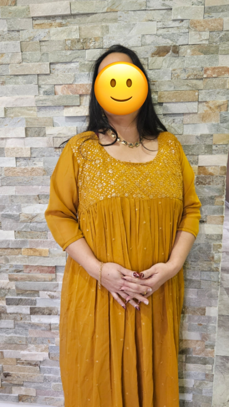 Front pleated mustard yellow gown with embroidery and sequence work