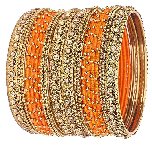 Metalic bangle set with  orange silk thread and golden stones in antique colour