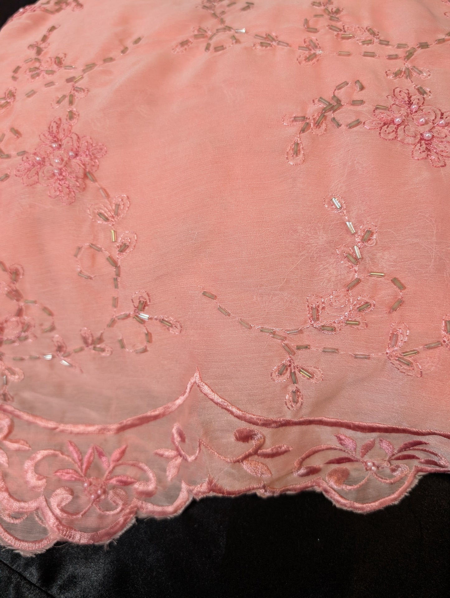 Light peach saree with cut beads and embroidery and scalloped border