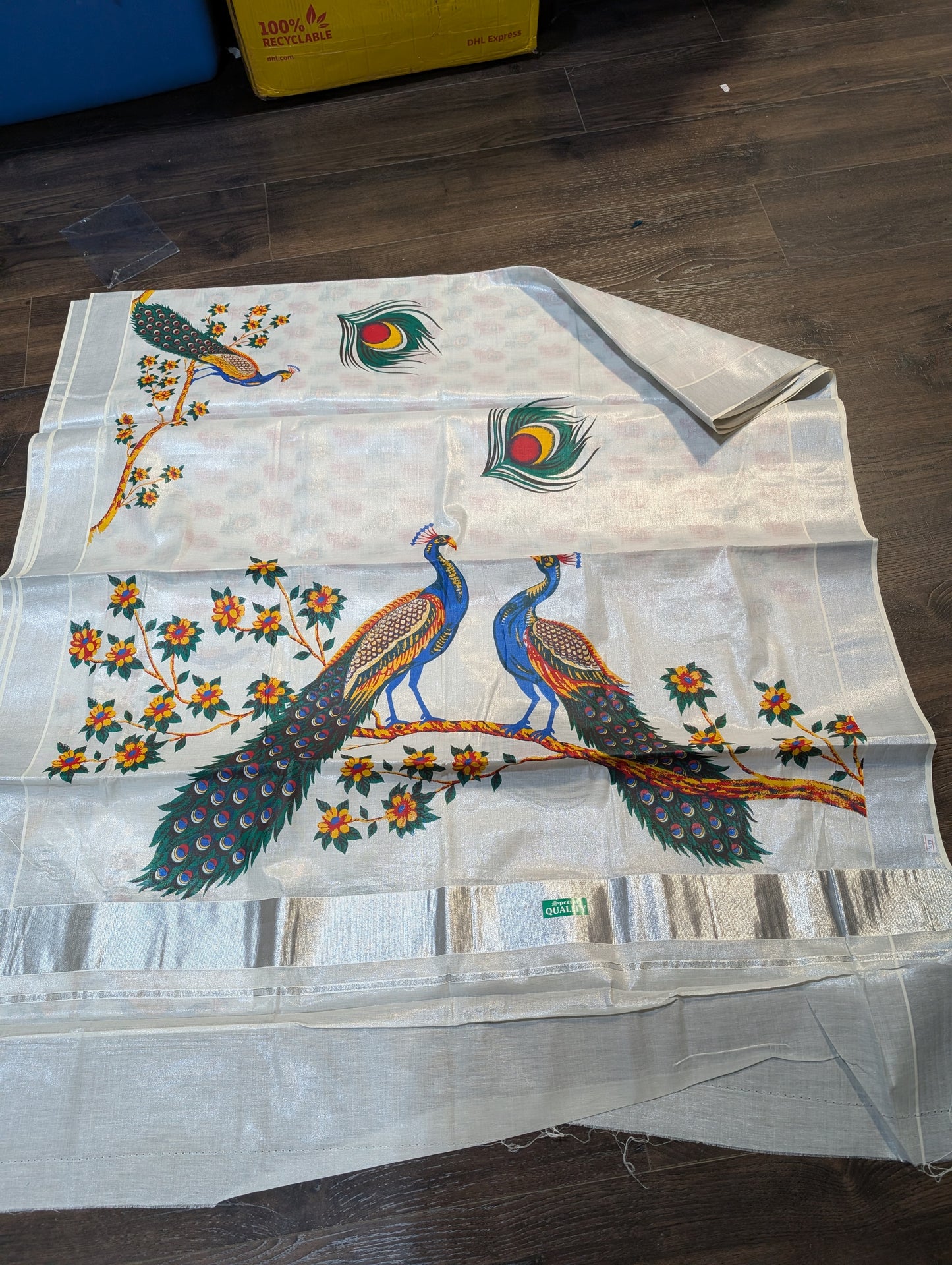 Silver tissue saree with peacock digital prints and silver border and printed blouse