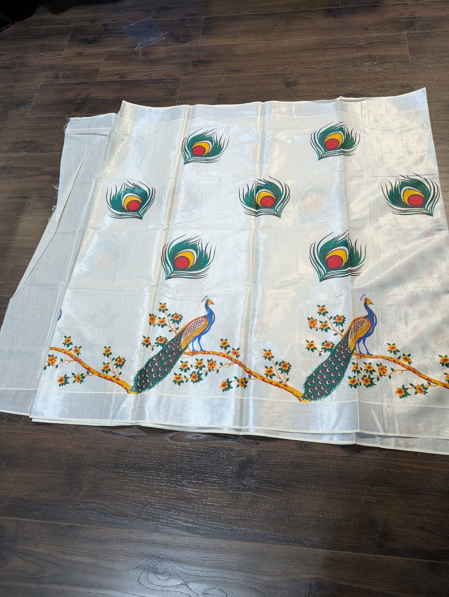 Silver tissue saree with peacock digital prints and silver border and printed blouse