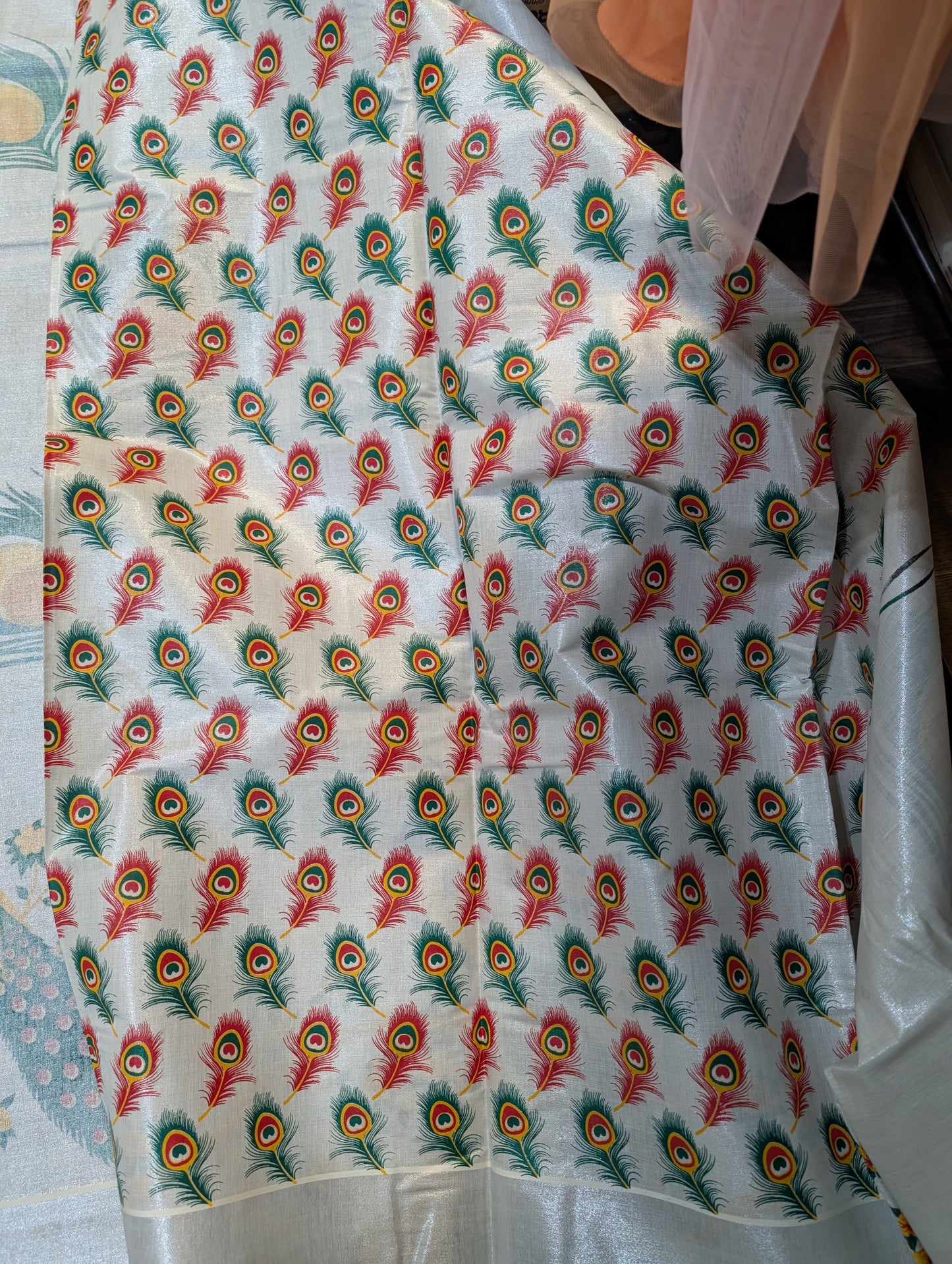 Silver tissue saree with peacock digital prints and silver border and printed blouse
