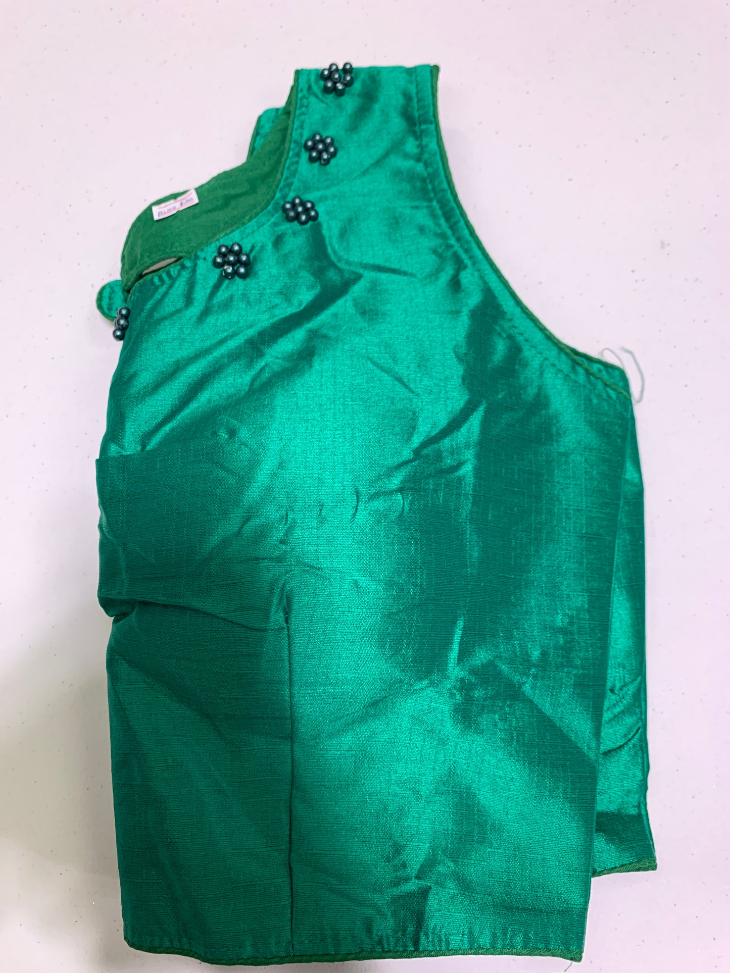 Green pearl neck work sleeveless blouse