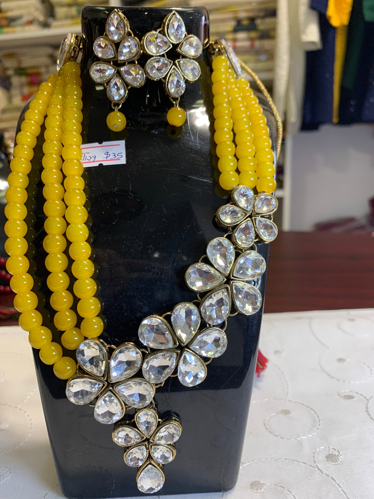 Yellow pearls floral crystal design necklace