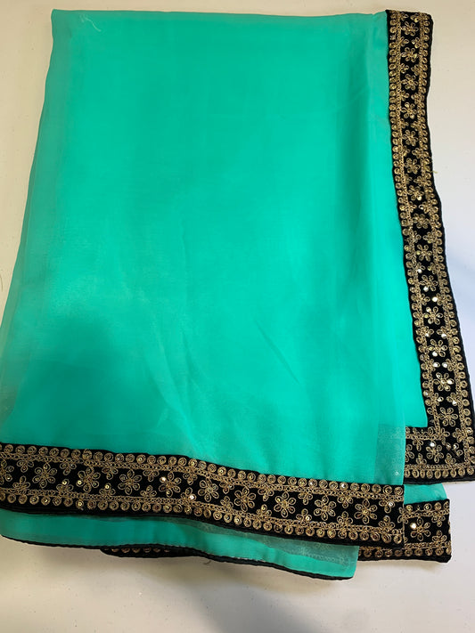 Green black border chiffon saree